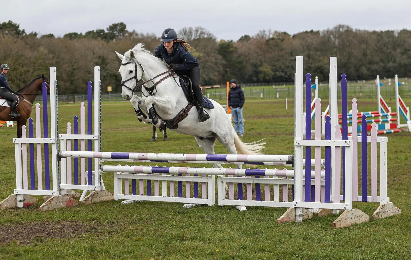 Jo and Tully showjumping during training at Tweseldown